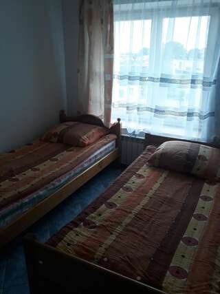 Проживание в семье Pod Miłorzębem Унеюв Двухместный номер с 2 отдельными кроватями и собственной ванной комнатой-1